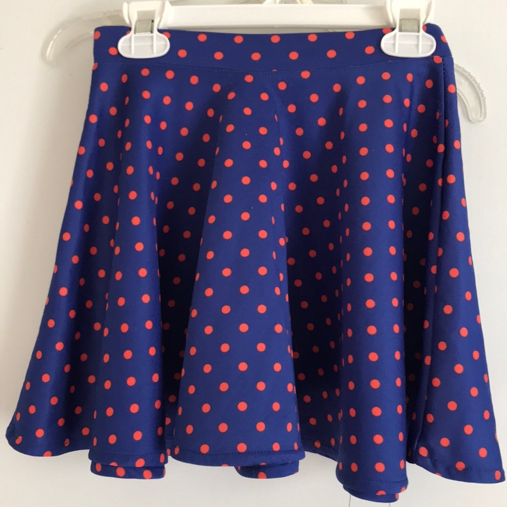 Blue skirt with red polka dots